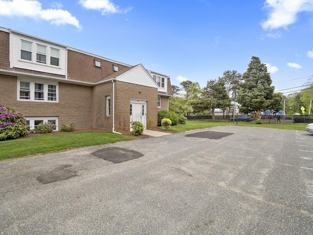 24 Bettys Pond Rd Unit K, Barnstable, MA 02601 - view of property exterior featuring brick siding