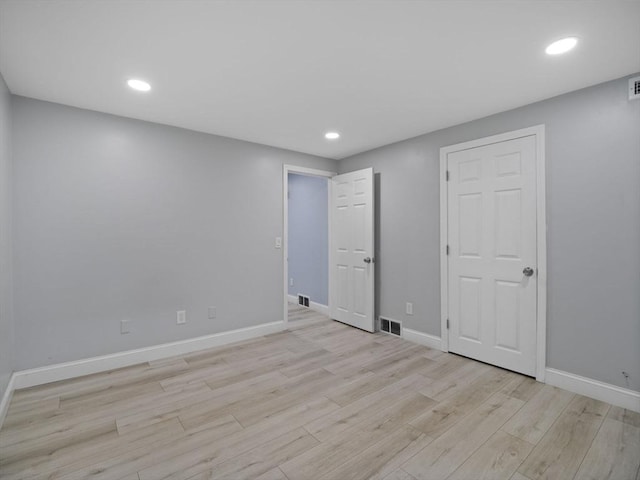 24 Bettys Pond Rd Unit K, Barnstable, MA 02601 - unfurnished bedroom featuring light wood-style floors, baseboards, and recessed lighting