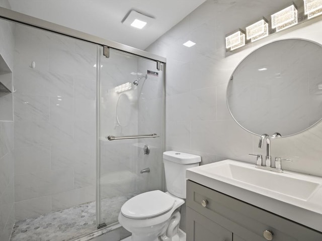 24 Bettys Pond Rd Unit K, Barnstable, MA 02601 - full bathroom with tile walls, vanity, toilet, and a stall shower
