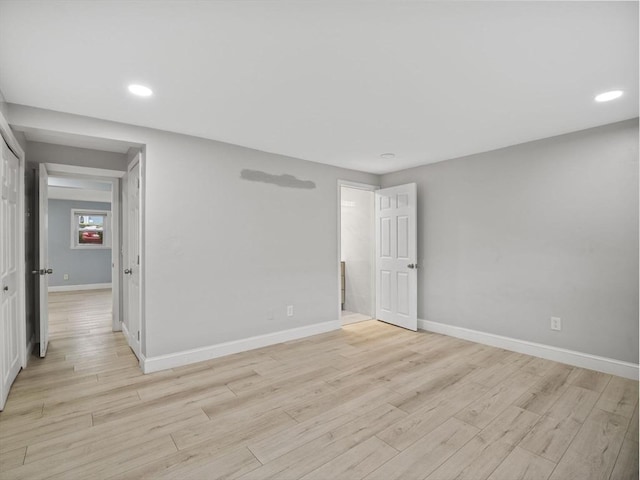 24 Bettys Pond Rd Unit K, Barnstable, MA 02601 - empty room with baseboards, light wood-style floors, and recessed lighting