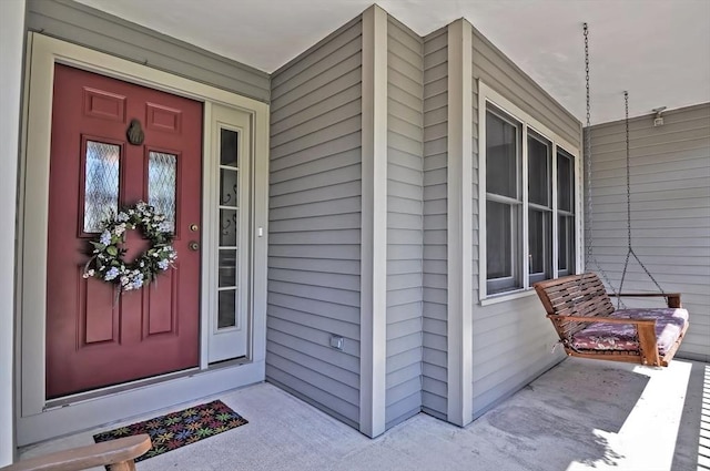 entrance to property with covered porch