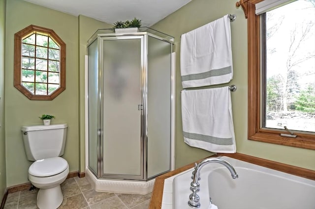 full bathroom with a bath, toilet, and a shower stall