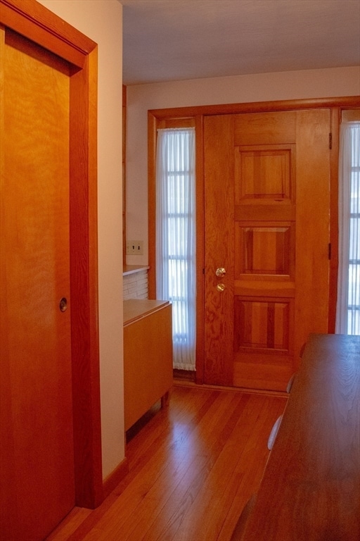 entryway with light hardwood / wood-style flooring