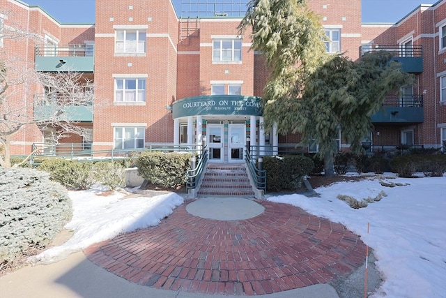 view of snow covered building