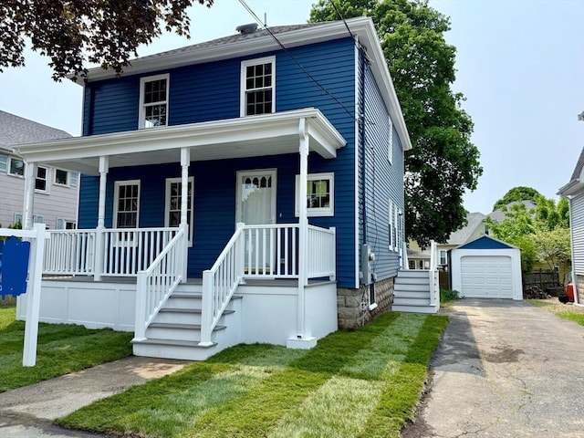 61 Poplar St, Danvers, MA 01923 - american foursquare style home with covered porch, driveway, a garage, an outdoor structure, and a front yard
