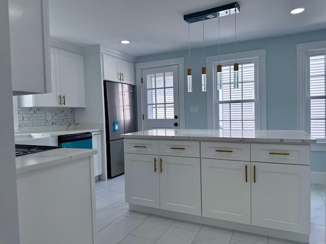 61 Poplar St, Danvers, MA 01923 - kitchen featuring white cabinets, freestanding refrigerator, light marble finish flooring, light stone countertops, and recessed lighting