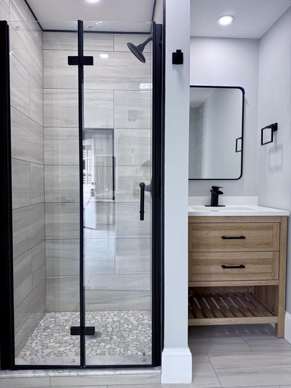 61 Poplar St, Danvers, MA 01923 - full bathroom with vanity, a shower stall, and recessed lighting