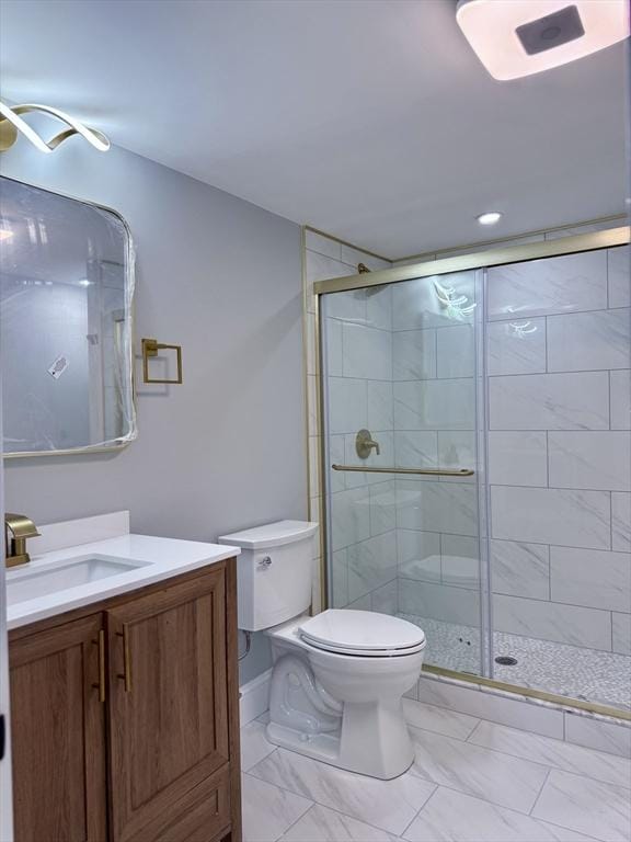 61 Poplar St, Danvers, MA 01923 - full bath featuring toilet, vanity, a stall shower, and marble look tiles