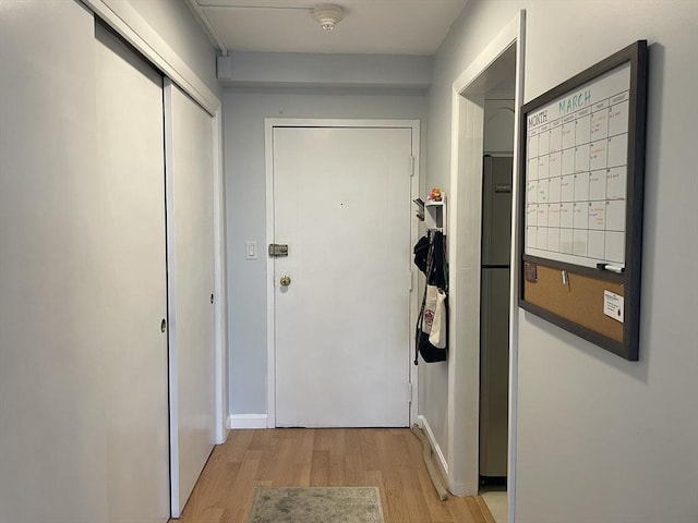 doorway featuring light wood-style floors