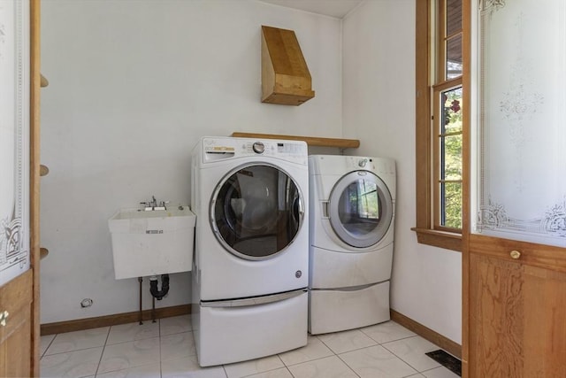 27 Sullivan Blvd, Oxford, MA 01540 - clothes washing area featuring independent washer and dryer and baseboards