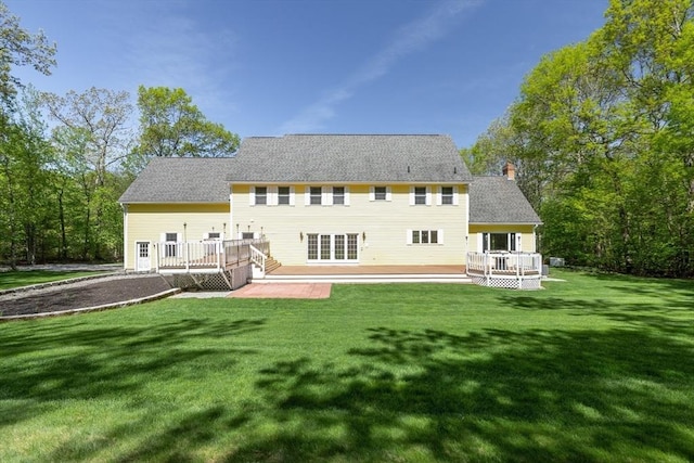 27 Sullivan Blvd, Oxford, MA 01540 - back of house featuring a deck, a chimney, a lawn, and a patio area