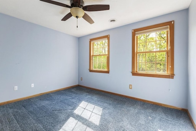27 Sullivan Blvd, Oxford, MA 01540 - carpeted empty room with baseboards and a ceiling fan