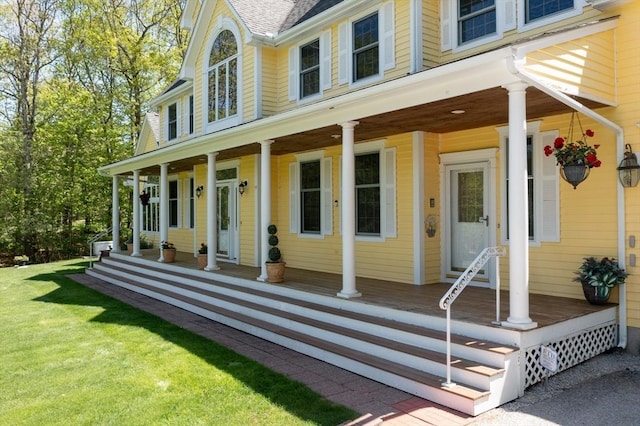 27 Sullivan Blvd, Oxford, MA 01540 - view of front of home featuring covered porch, roof with shingles, and a front yard