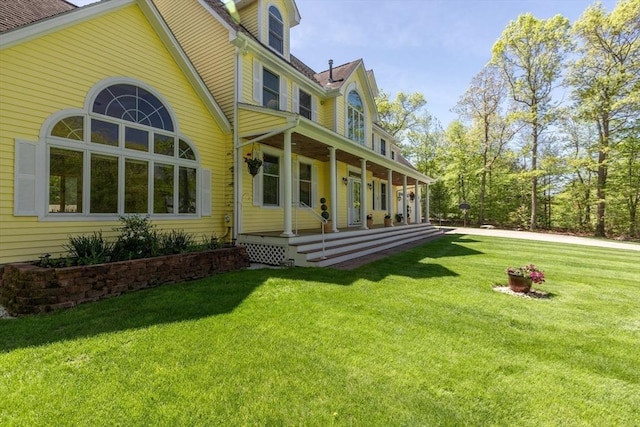27 Sullivan Blvd, Oxford, MA 01540 - back of house with a porch and a yard