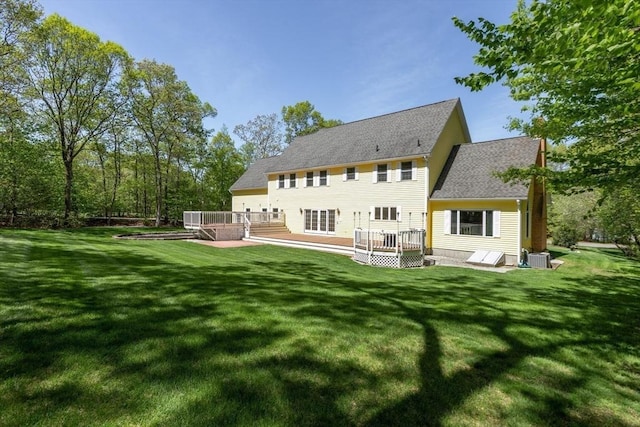 27 Sullivan Blvd, Oxford, MA 01540 - back of property with a wooden deck and a yard