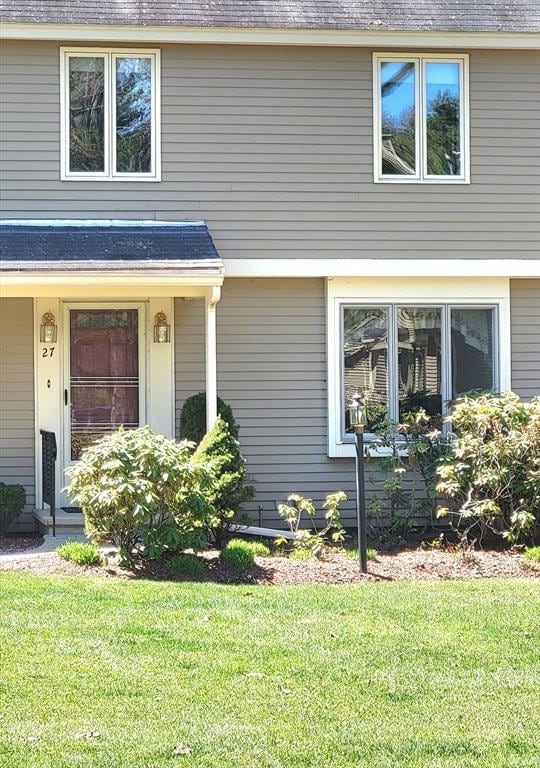 15 Iris Way Unit 27, Haverhill, MA 01830 - view of front of home with a front yard and roof with shingles