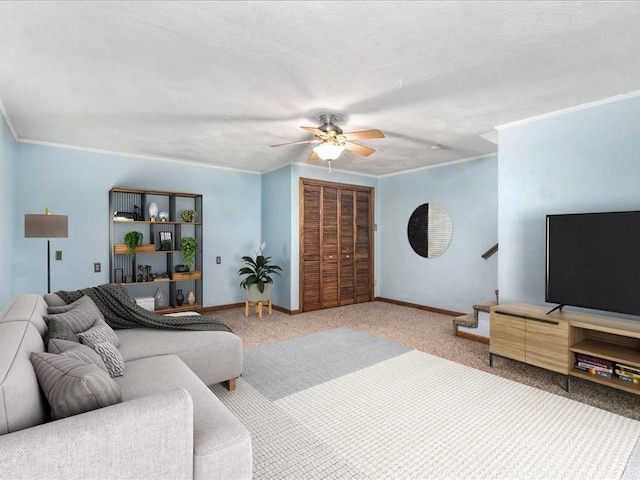 44 Casablanca Ct Unit 44, Haverhill, MA 01832 - living room with ceiling fan, stairs, baseboards, crown molding, and carpet
