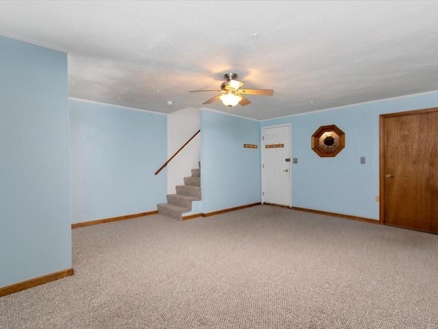44 Casablanca Ct Unit 44, Haverhill, MA 01832 - unfurnished living room with baseboards, a ceiling fan, stairs, carpet floors, and ornamental molding
