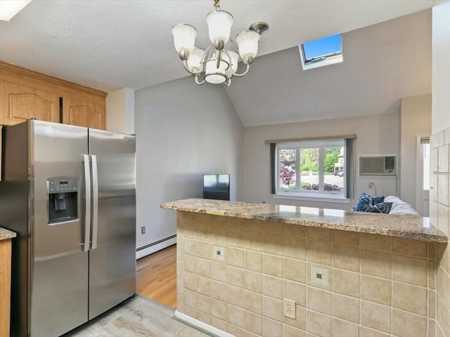 44 Casablanca Ct Unit 44, Haverhill, MA 01832 - kitchen with stainless steel fridge with ice dispenser, a baseboard heating unit, light wood finished floors, lofted ceiling, and a chandelier