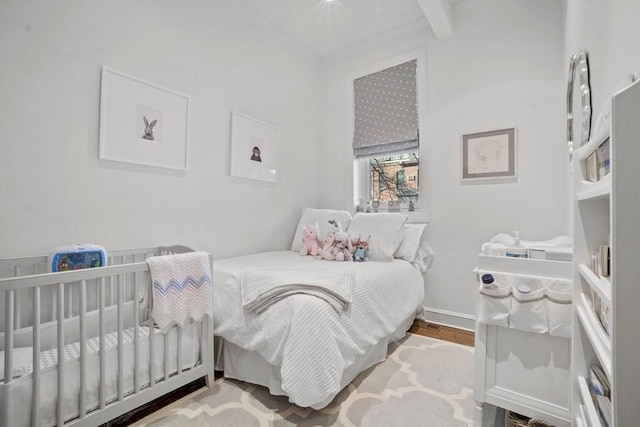 bedroom with light wood-type flooring