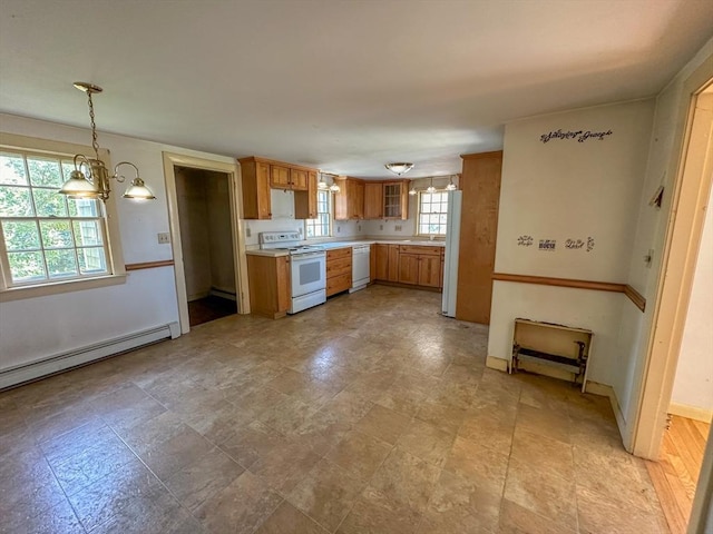 kitchen featuring white appliances, decorative light fixtures, a chandelier, and a baseboard radiator