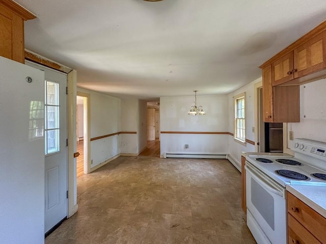 kitchen featuring a baseboard heating unit, electric range, decorative light fixtures, and a chandelier