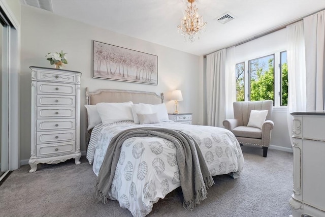 bedroom featuring carpet, a chandelier, and baseboards