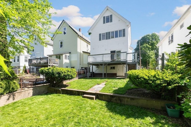 back of property featuring a deck