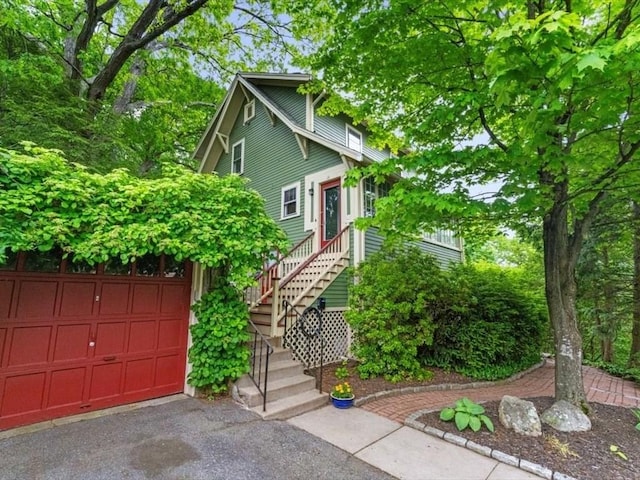 49 Fern Rd, Medford, MA 02155 - view of front facade featuring asphalt driveway