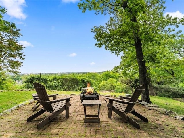 49 Fern Rd, Medford, MA 02155 - view of patio / terrace featuring an outdoor fire pit