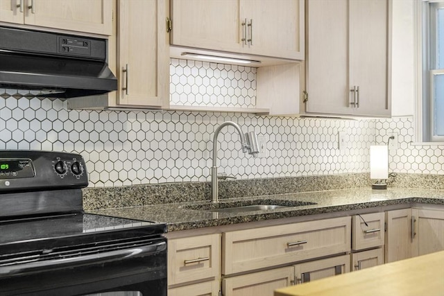 281 Chelsea St Unit 2A, Boston, MA 02128 - kitchen featuring black / electric stove, extractor fan, decorative backsplash, and dark stone countertops