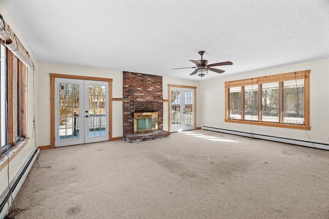 1210 Highland St, Holliston, MA 01746 - unfurnished living room with french doors, a baseboard radiator, carpet floors, and a textured ceiling