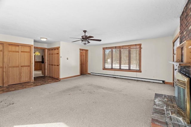 1210 Highland St, Holliston, MA 01746 - unfurnished living room with baseboard heating, a ceiling fan, carpet flooring, and a fireplace