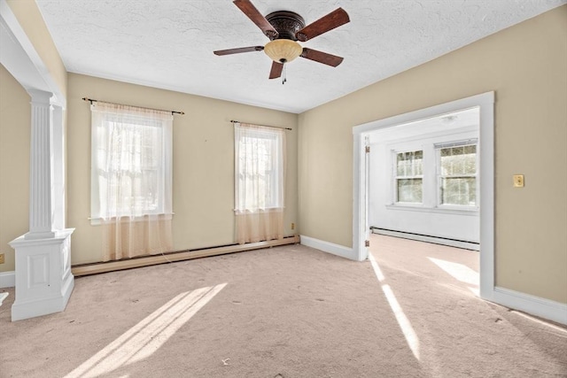 1210 Highland St, Holliston, MA 01746 - carpeted spare room with decorative columns, baseboard heating, a textured ceiling, and ceiling fan
