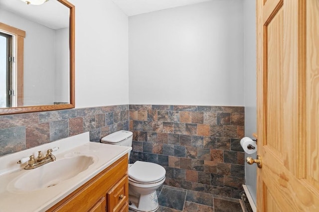 1210 Highland St, Holliston, MA 01746 - bathroom with tile walls, vanity, and a wainscoted wall