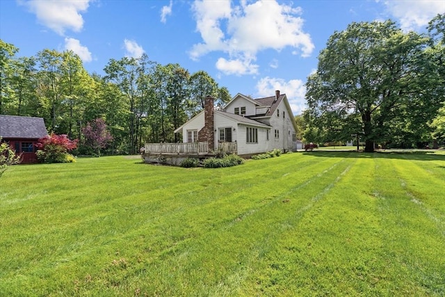 1210 Highland St, Holliston, MA 01746 - view of grassy yard featuring a deck
