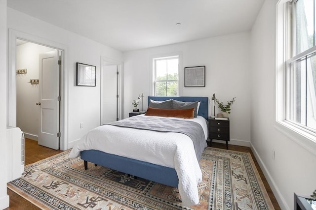 9 Cedar St Unit 1, Boston, MA 02119 - bedroom featuring baseboards and wood finished floors