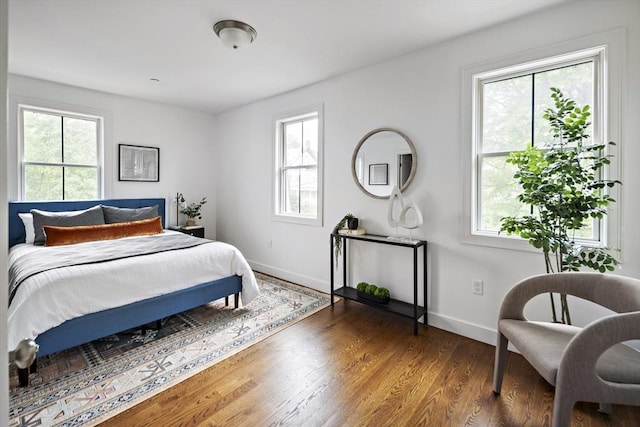 9 Cedar St Unit 1, Boston, MA 02119 - bedroom with wood finished floors and baseboards