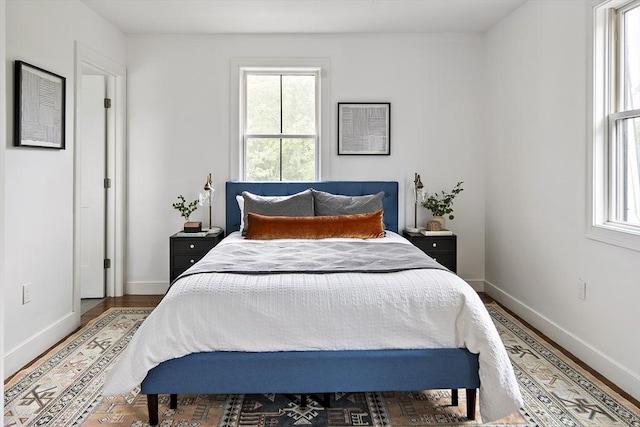 9 Cedar St Unit 1, Boston, MA 02119 - bedroom with wood finished floors and baseboards