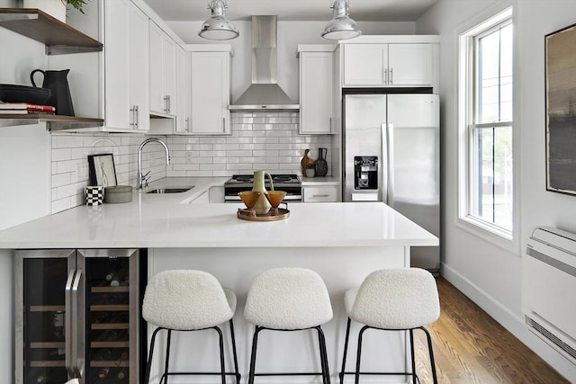 9 Cedar St Unit 1, Boston, MA 02119 - kitchen featuring wine cooler, a sink, wall chimney exhaust hood, stainless steel appliances, and open shelves