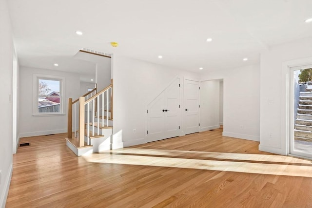 foyer with a healthy amount of sunlight and light wood-type flooring