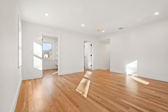 unfurnished room featuring light wood-type flooring