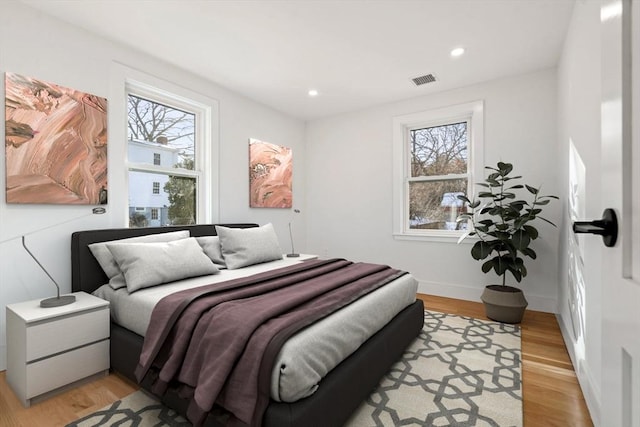 bedroom featuring light hardwood / wood-style flooring