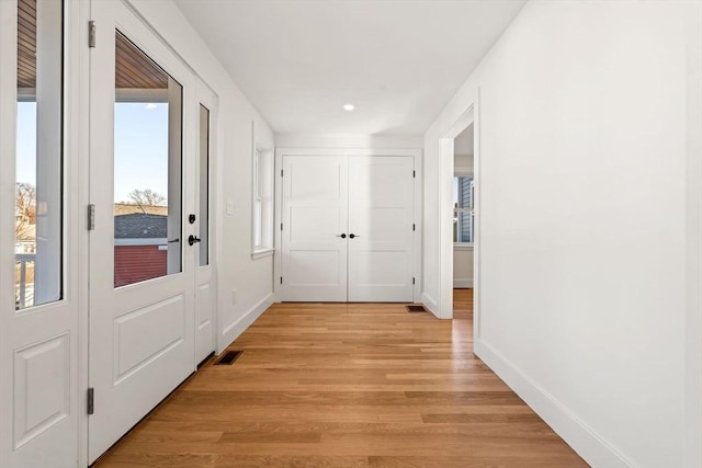 hallway featuring light hardwood / wood-style floors