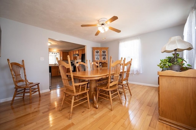2 Garden St, Uxbridge, MA 01569 - dining room featuring ceiling fan, baseboards, and light wood-style flooring