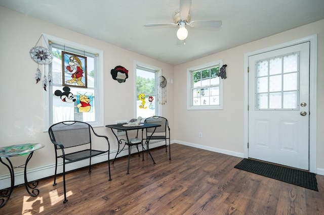 2 Garden St, Uxbridge, MA 01569 - dining area featuring dark wood-style floors, ceiling fan, baseboards, and a baseboard radiator