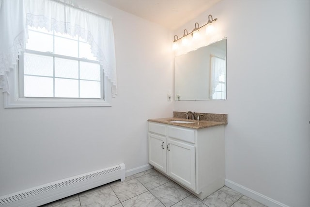 2 Garden St, Uxbridge, MA 01569 - bathroom with a baseboard radiator, marble finish flooring, vanity, and baseboards