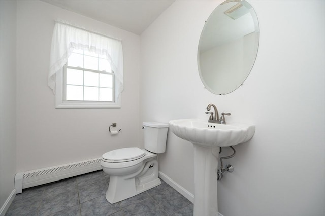 2 Garden St, Uxbridge, MA 01569 - bathroom featuring a baseboard heating unit, baseboards, toilet, and tile patterned flooring