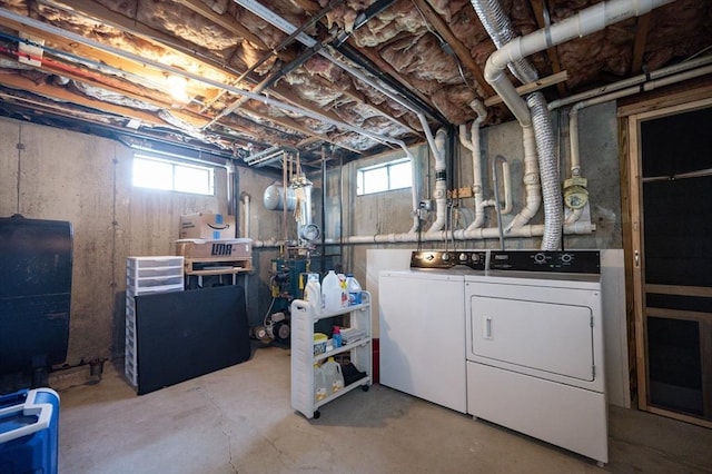2 Garden St, Uxbridge, MA 01569 - basement with washer and dryer, oil tank, and plenty of natural light