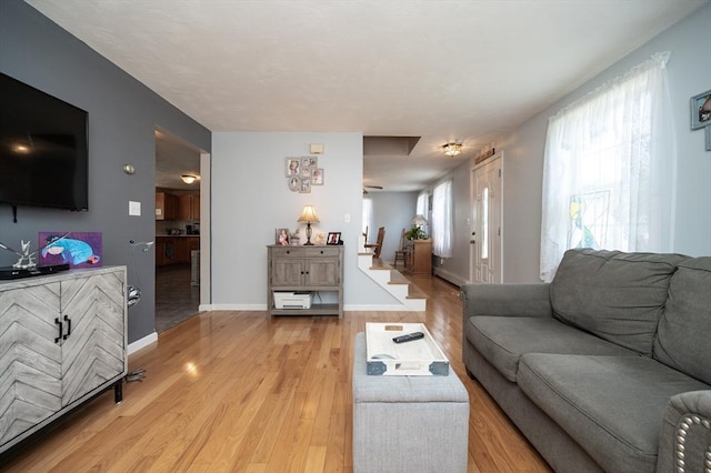 2 Garden St, Uxbridge, MA 01569 - living room with light wood-style flooring and baseboards
